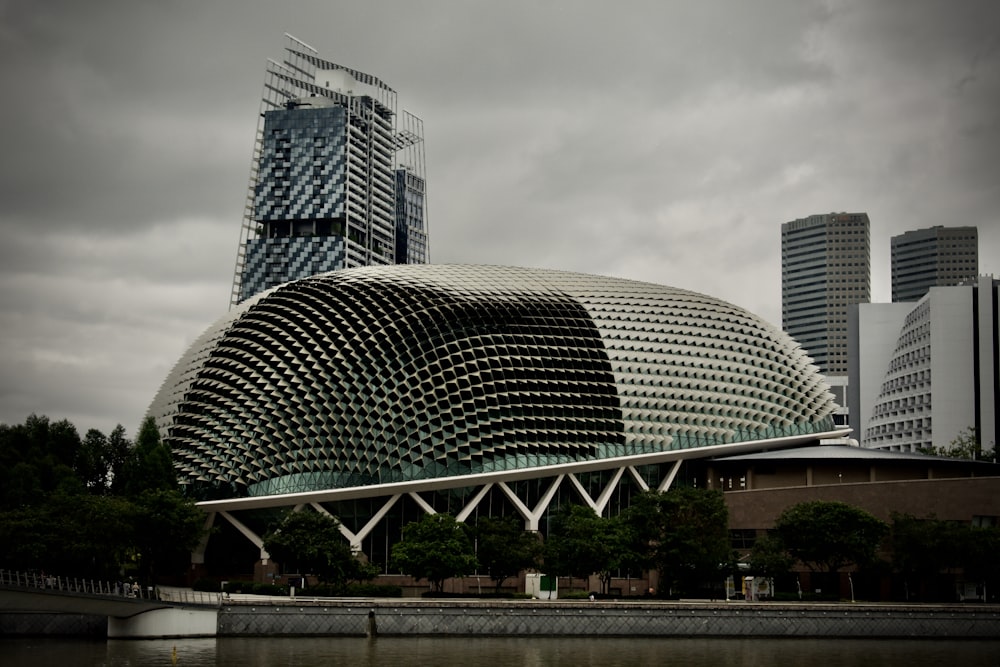 gray and black concrete building under gray sky during daytime