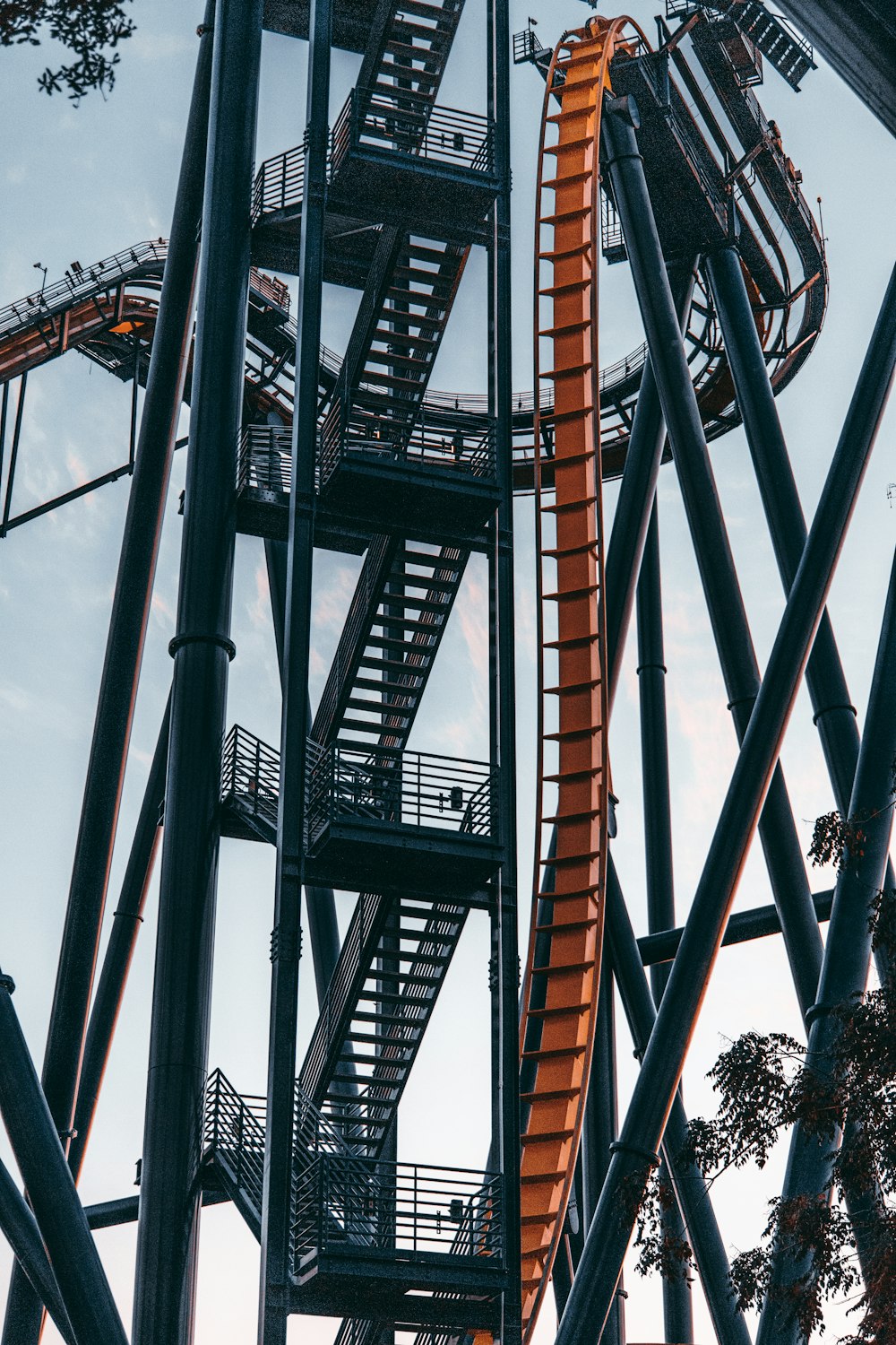black and orange roller coaster rail