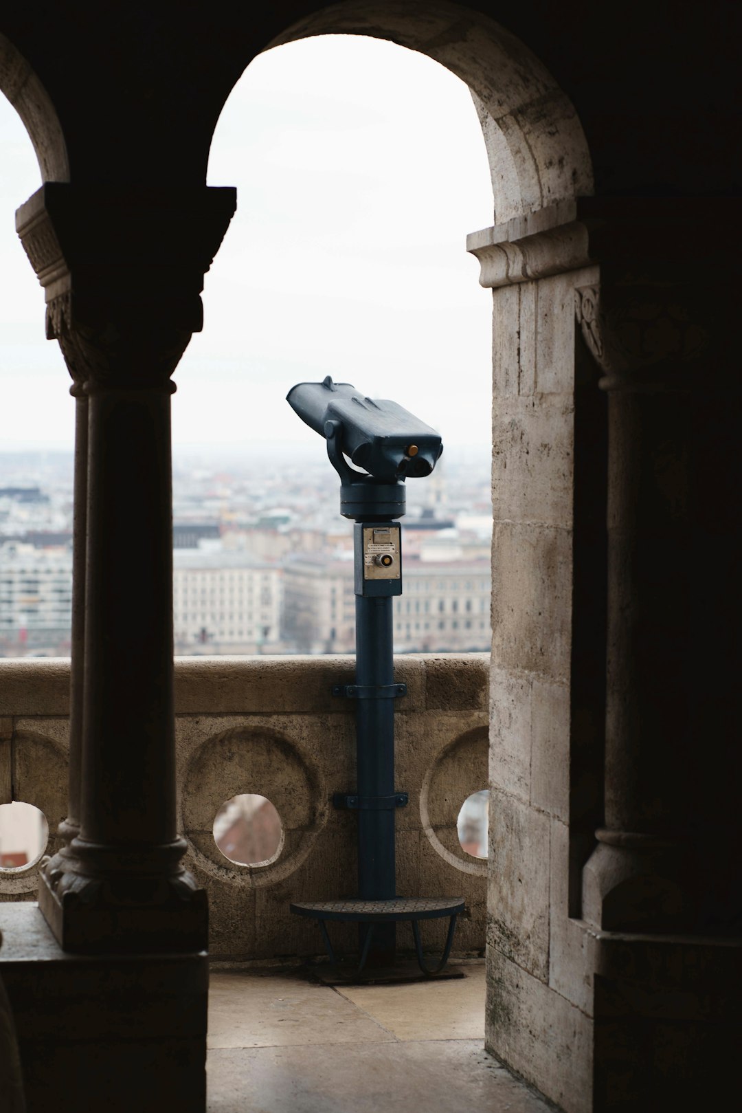 black and gray binoculars on top of building