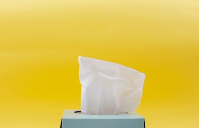 white tissue paper in blue box napkin teams background