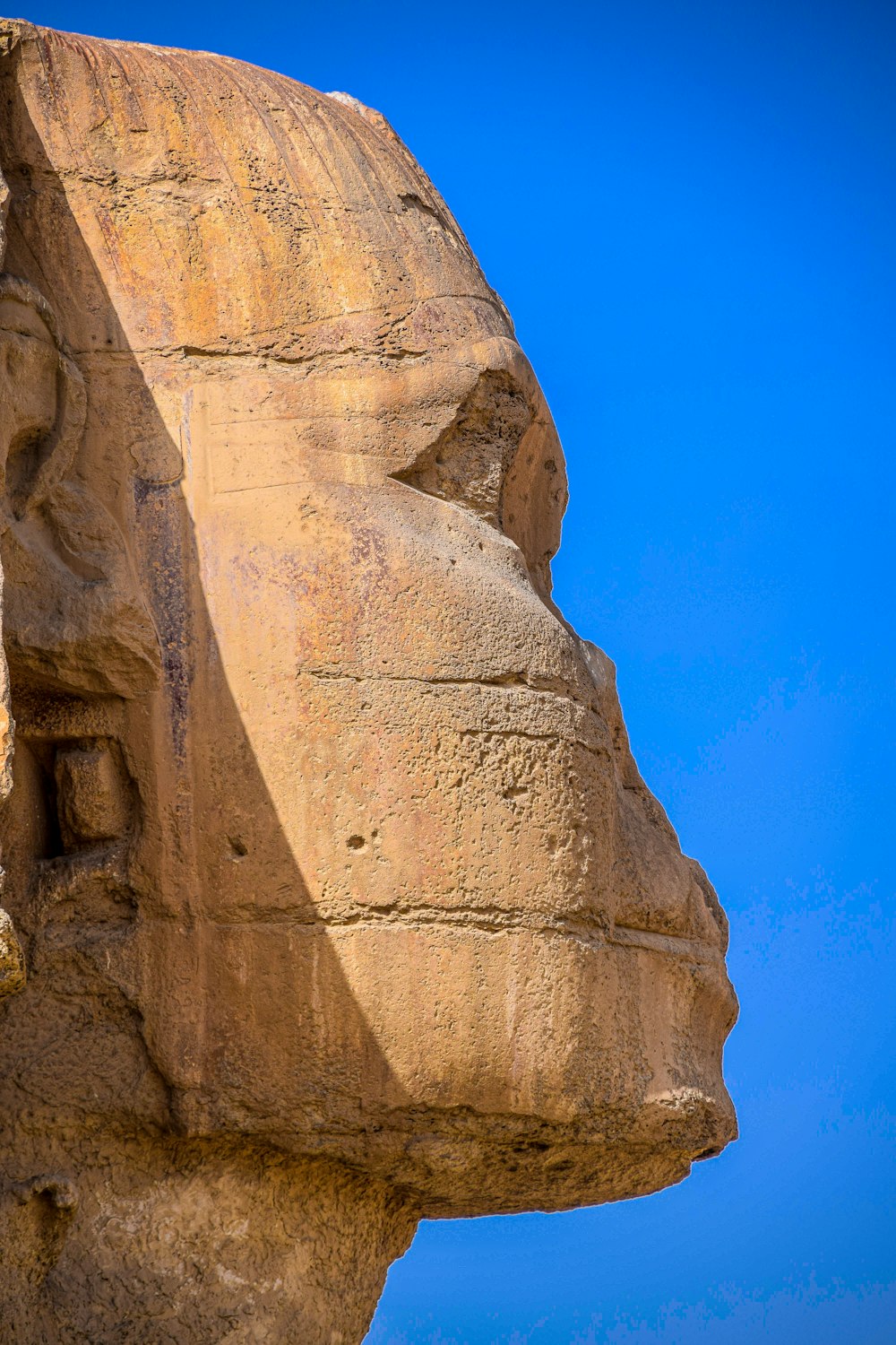 brown rock formation under blue sky during daytime