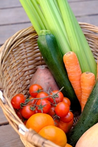 carrots and cucumber on brown woven basket for our provisioning service