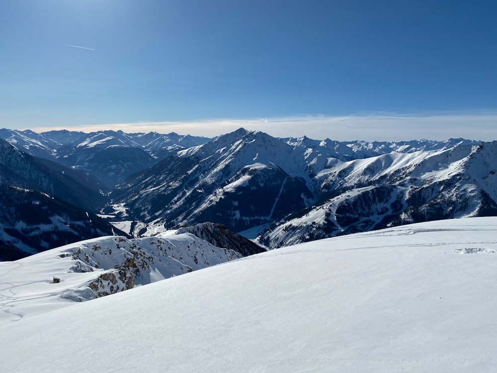 snow covered mountain under blue sky during daytime