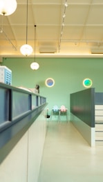 Professional cleaner using modern equipment in a bright, clean space