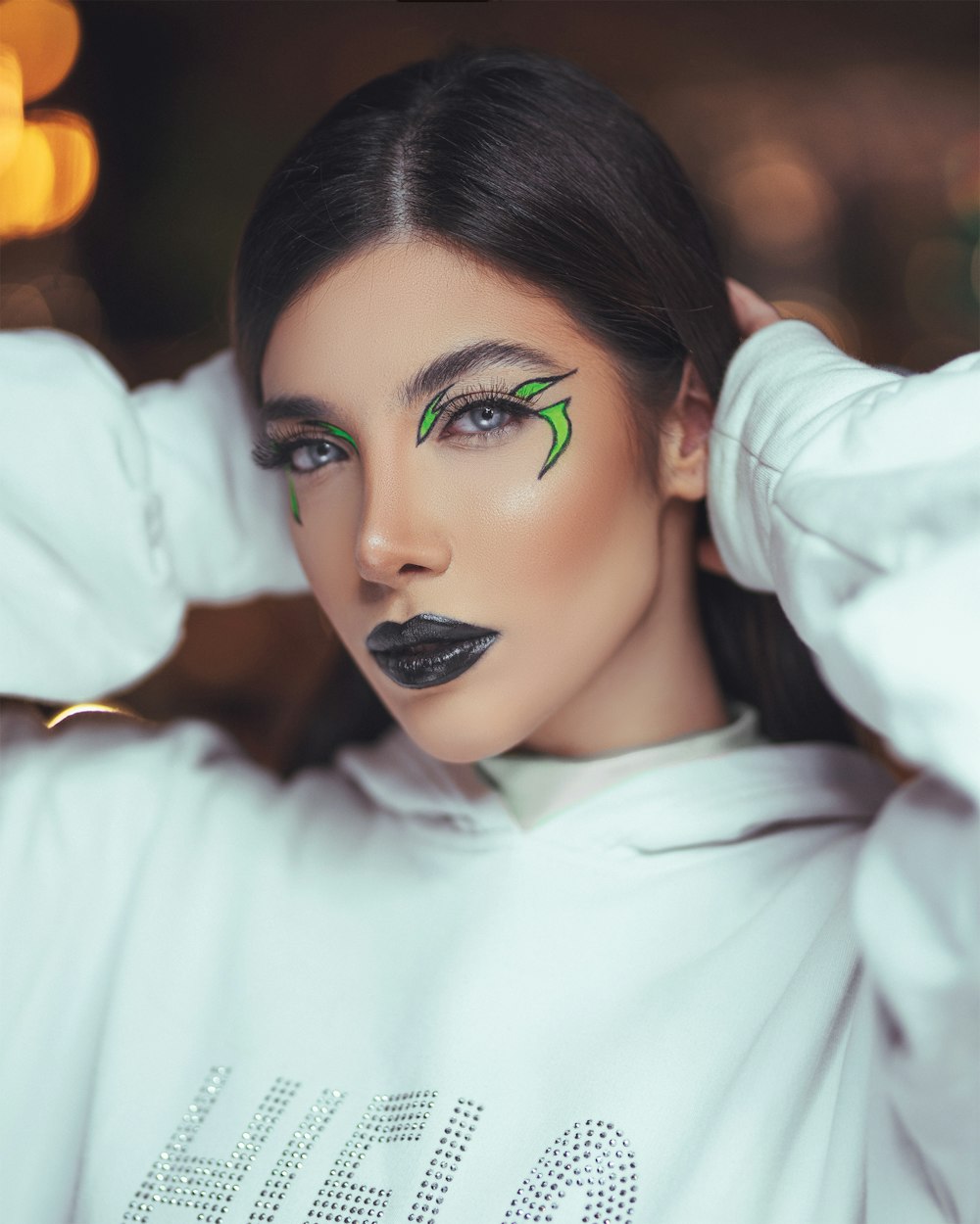 woman in white long sleeve shirt