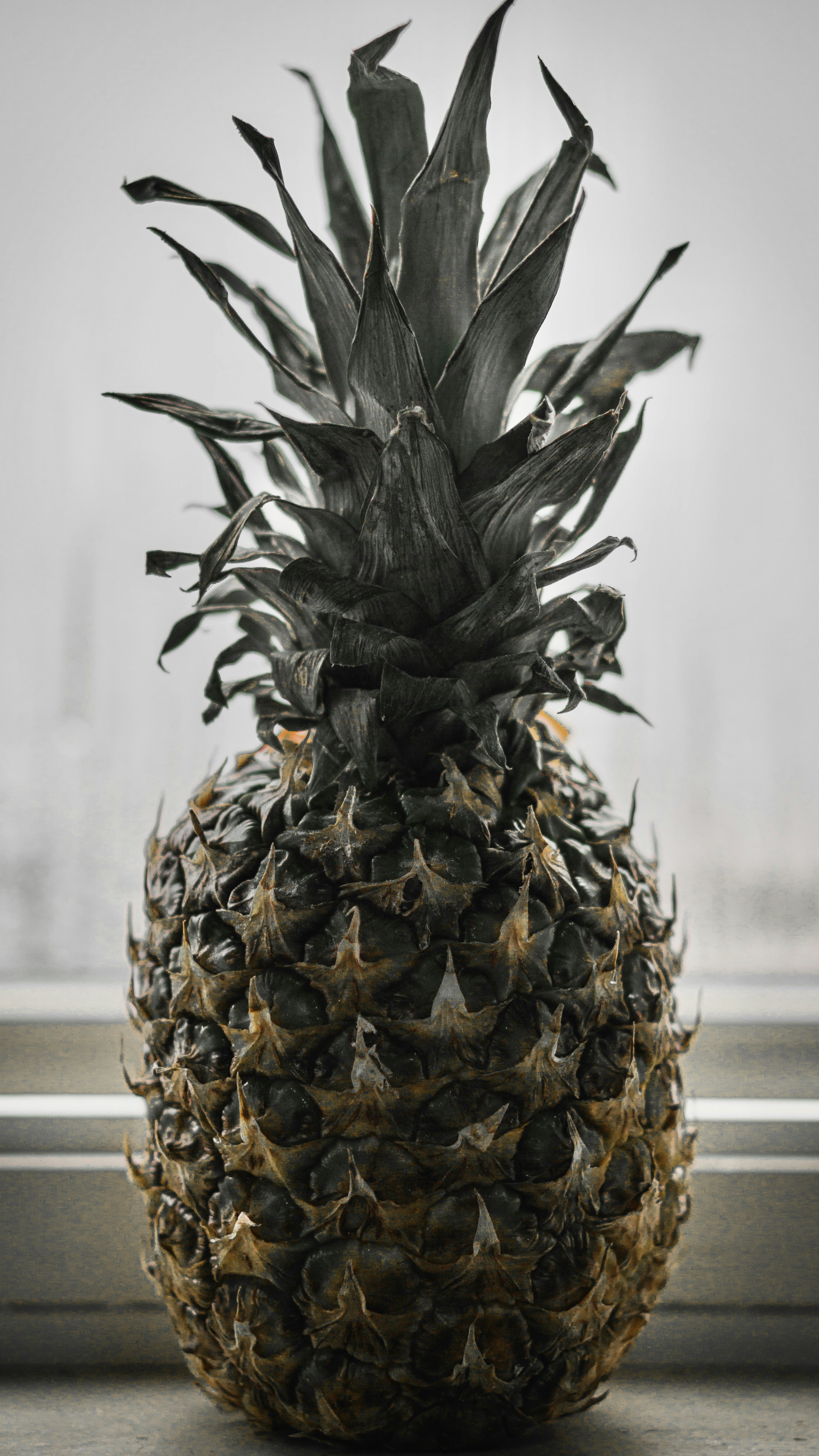 pineapple fruit on white table