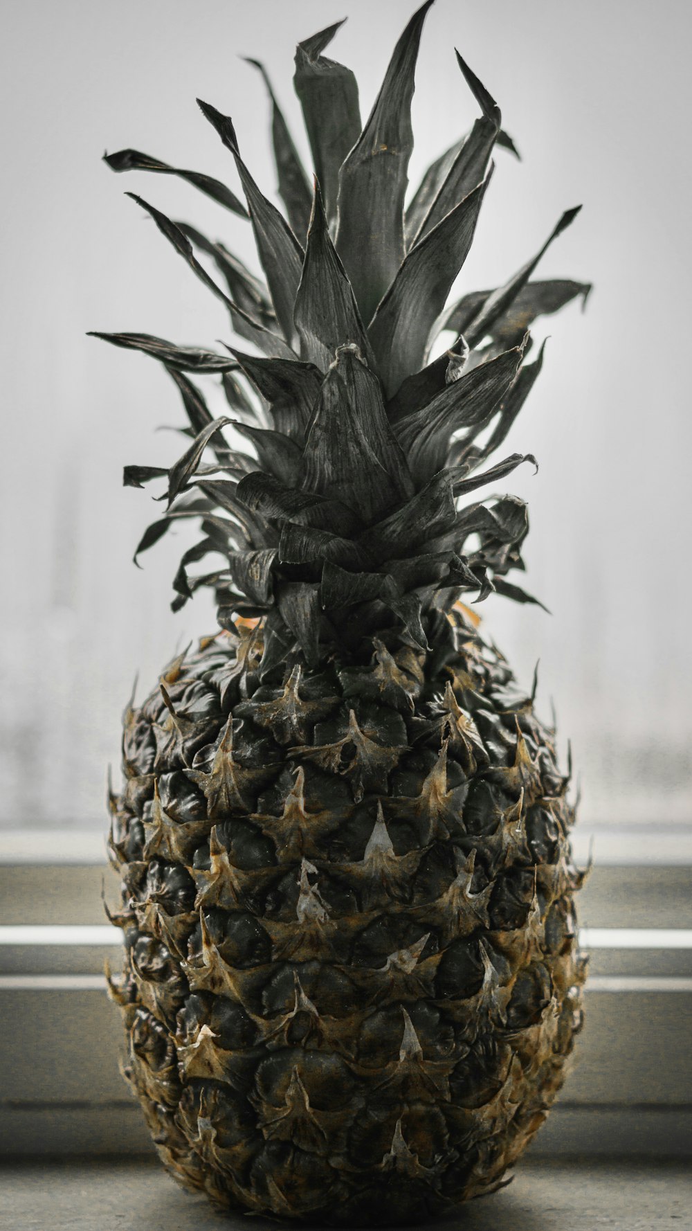 pineapple fruit on white table