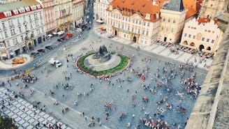 A scenic view of a historic city square where many of our hosting partners offer guided tours and local insights.
