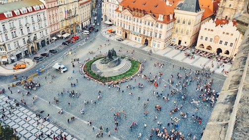 A scenic view of a historic city square where many of our hosting partners offer guided tours and local insights.