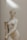 white ceramic statue of a woman