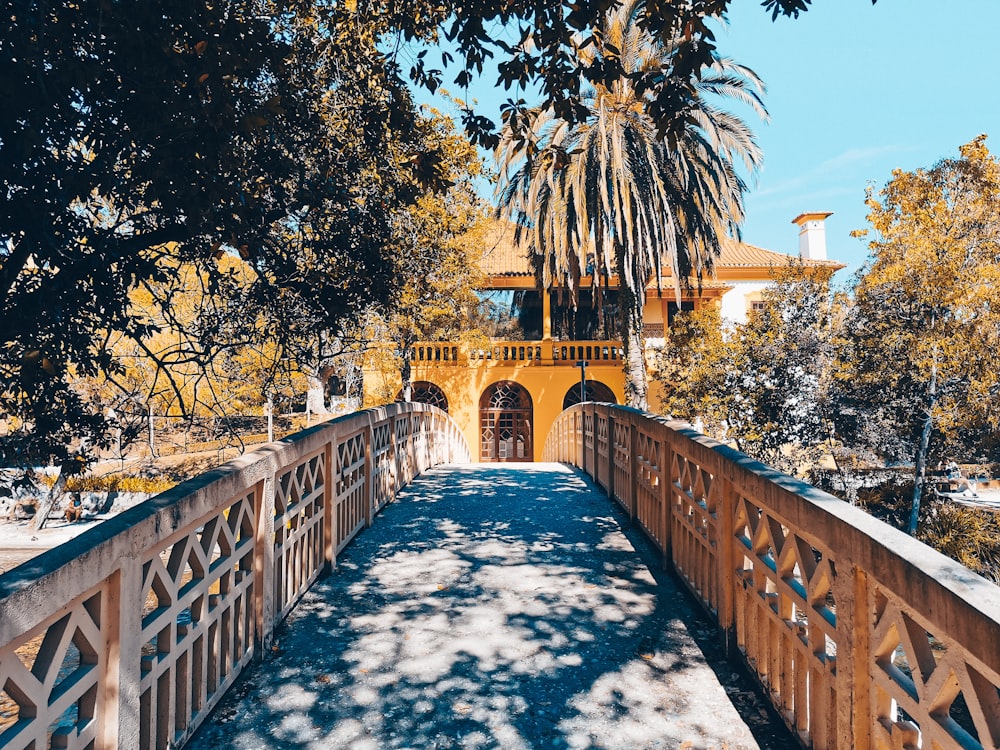 brown wooden bridge over river during daytime