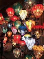 Close-up of colorful Chinese lanterns hanging in a festival setting.