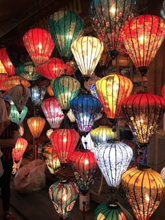Close-up of colorful Chinese lanterns hanging in a festival setting.
