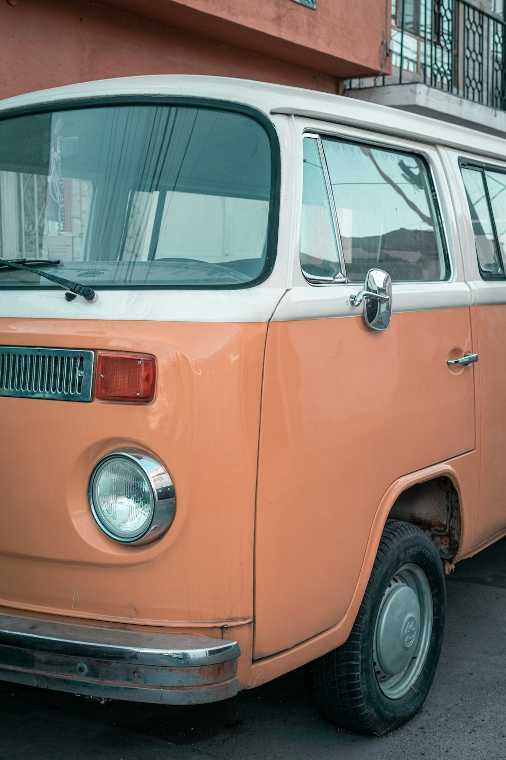 orange volkswagen t-2 van