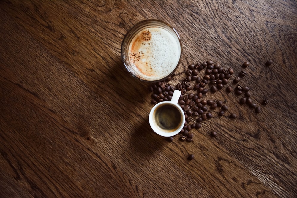 white ceramic mug on brown wooden table