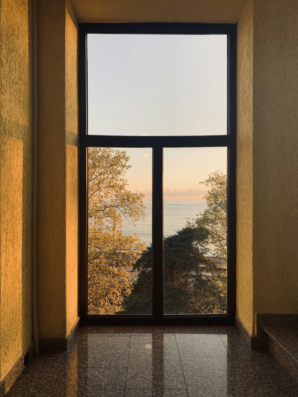 brown wooden framed glass window