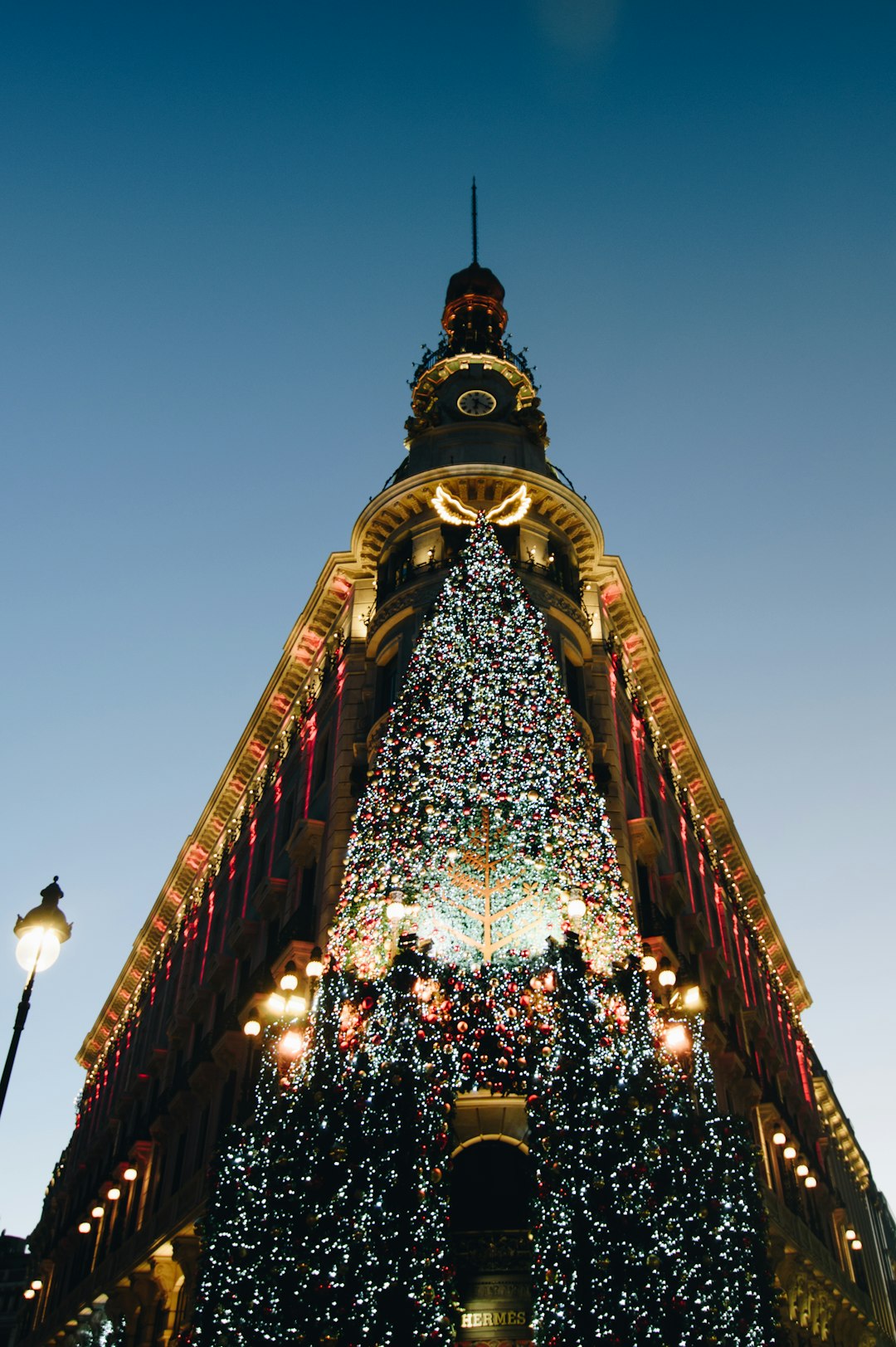 gold and black tower with string lights