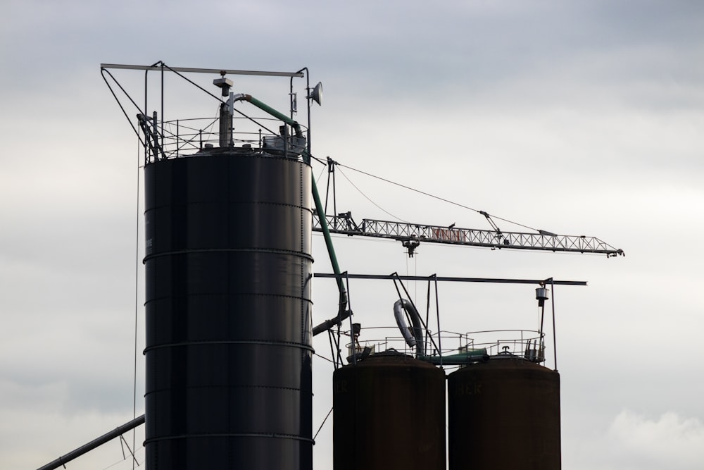 two large metal tanks sitting next to each other