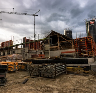 a construction site with a crane in the background