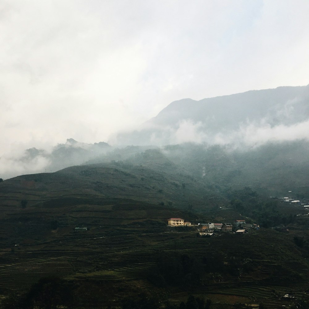 green mountains under white clouds during daytime