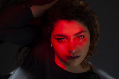 A striking film still showcasing a dynamic scene with bold lighting and vivid emotion.