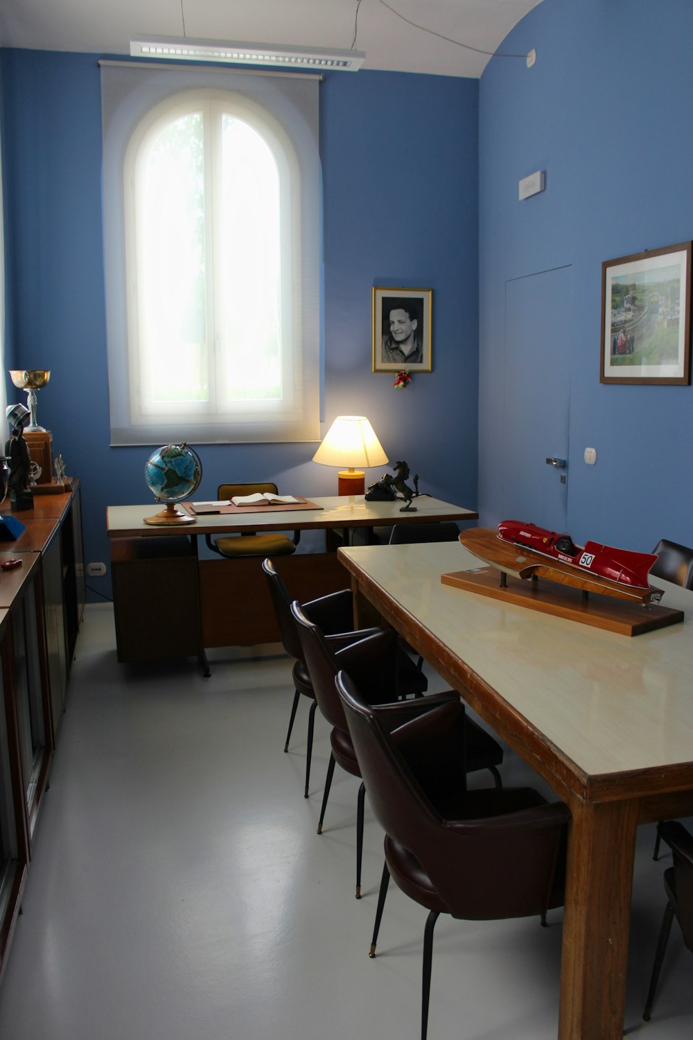 brown wooden table with chairs