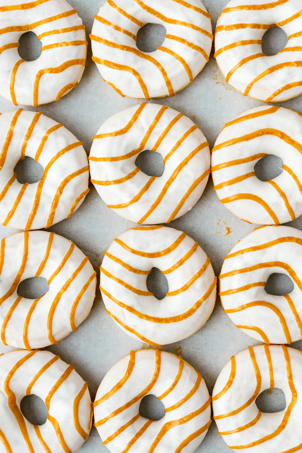 brown doughnut on white ceramic plate