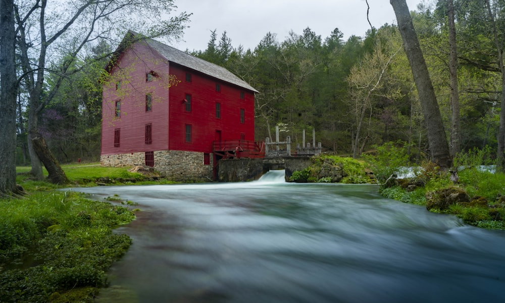 red and black house near river