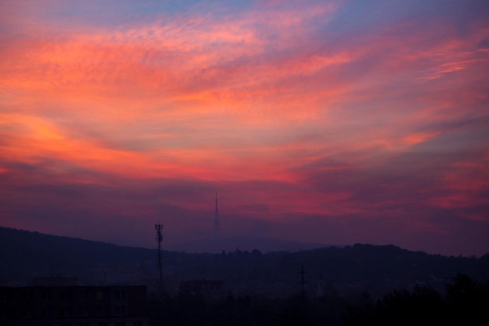 silhouette of mountain during sunset