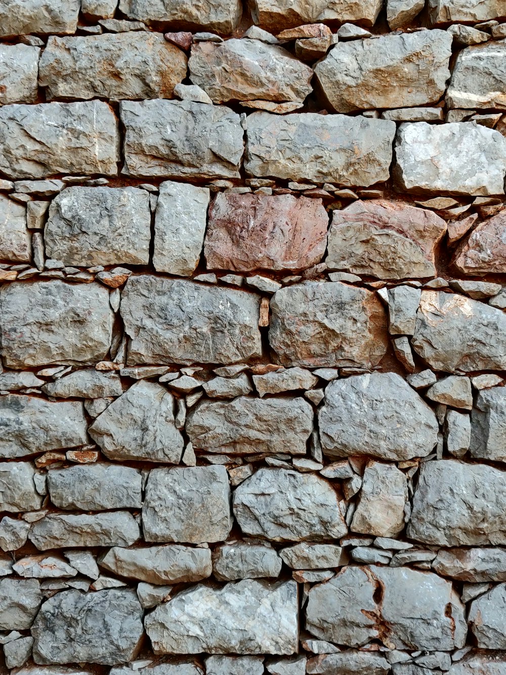 brown and gray brick wall