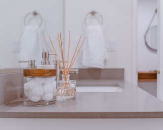 clear glass jar with brown sticks