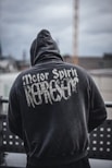 man in black and white hoodie