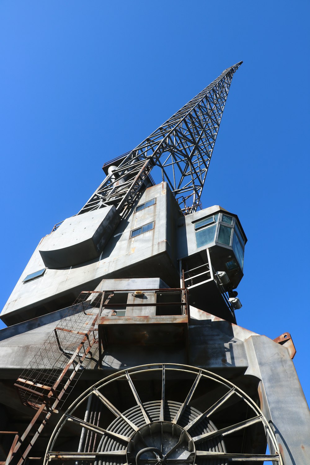 black and white metal tower under blue sky during daytime