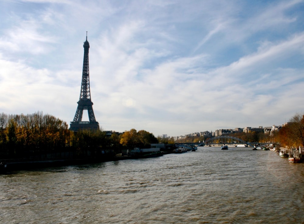 eiffel tower near body of water during daytime