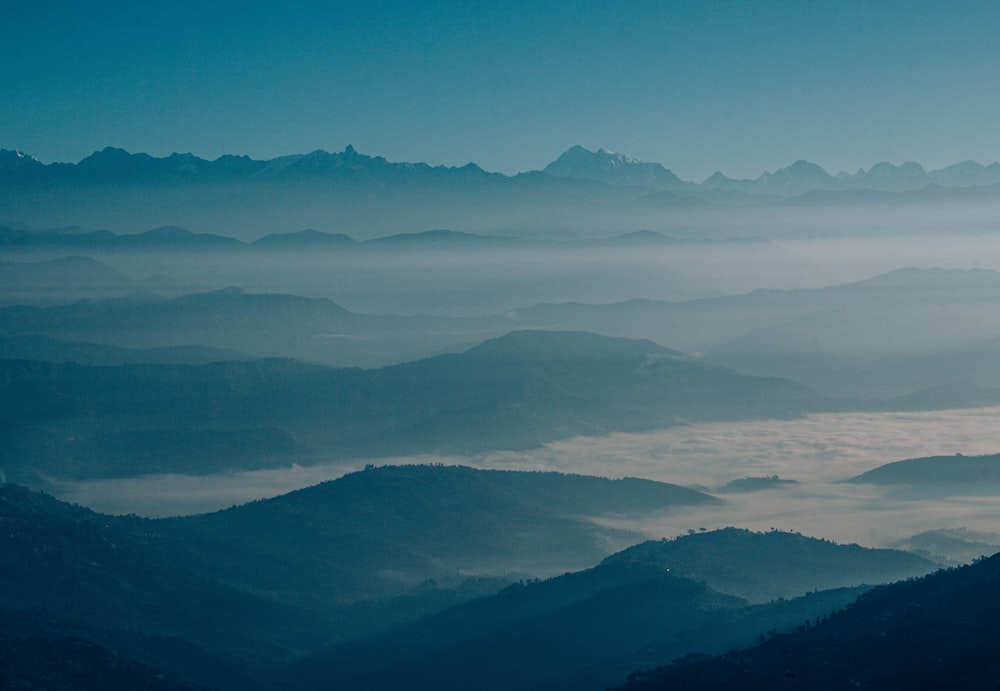 mountains under blue sky during daytime