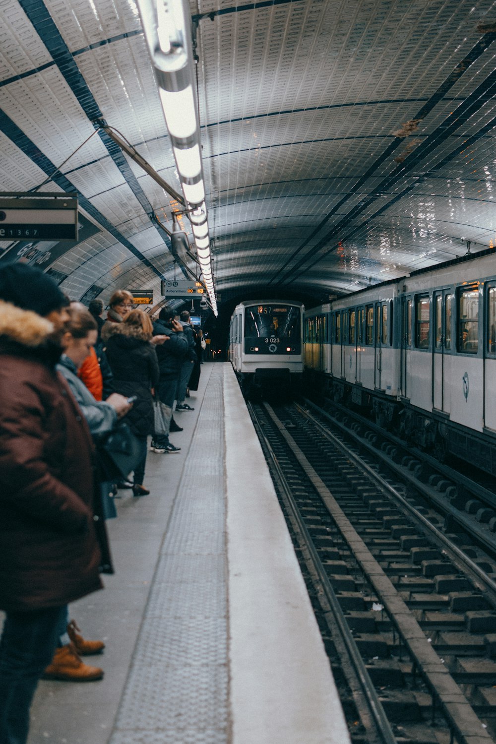 people walking on train station