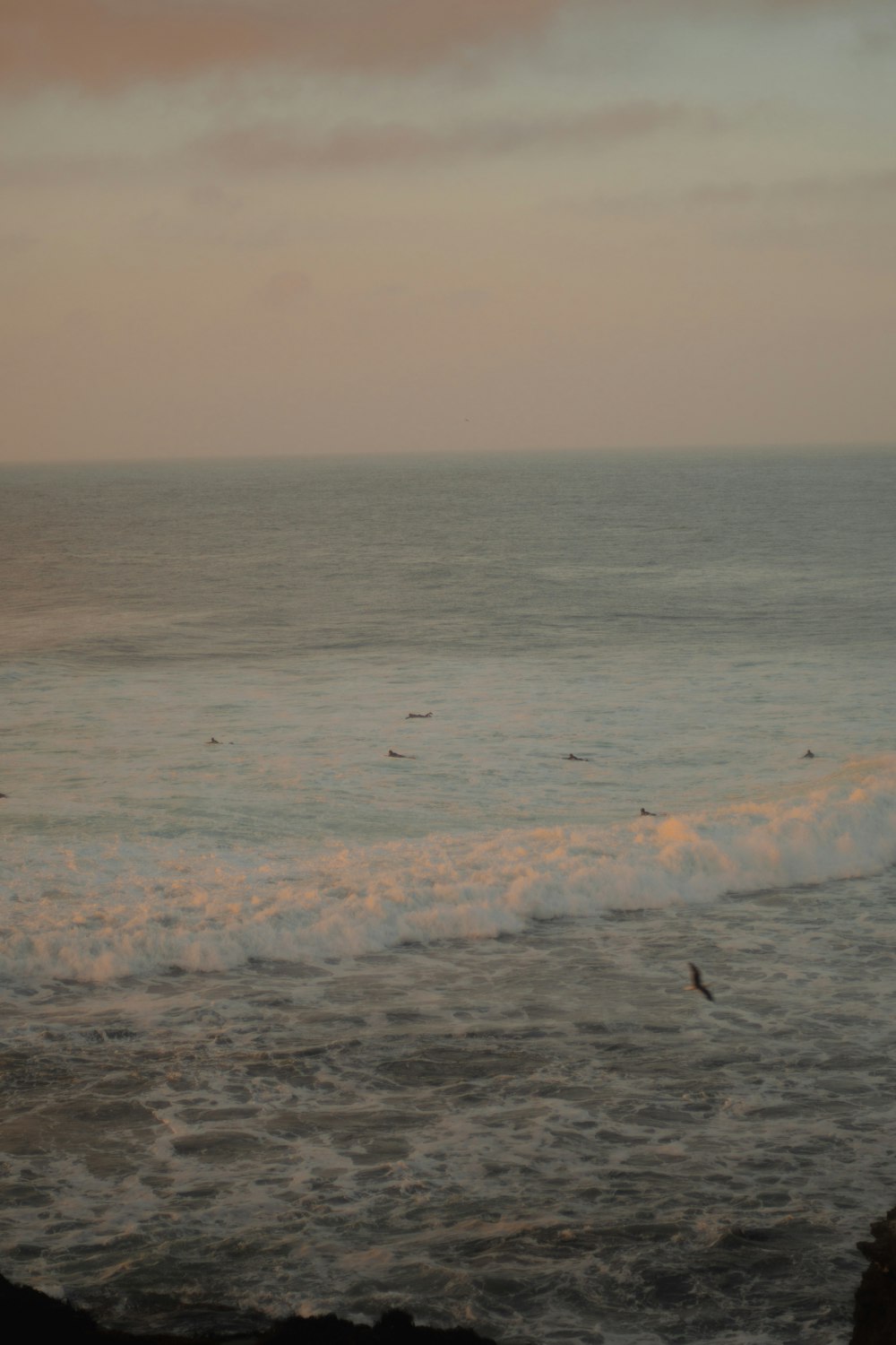 ocean waves crashing on shore during daytime