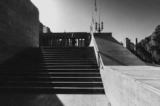 A warm image of a person climbing steps made of coins, symbolizing financial progress.