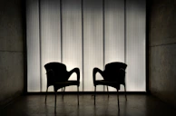 black chairs on brown wooden floor