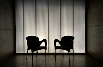 black chairs on brown wooden floor