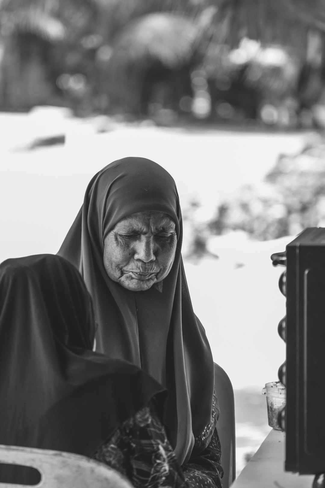 grayscale photo of man wearing hijab