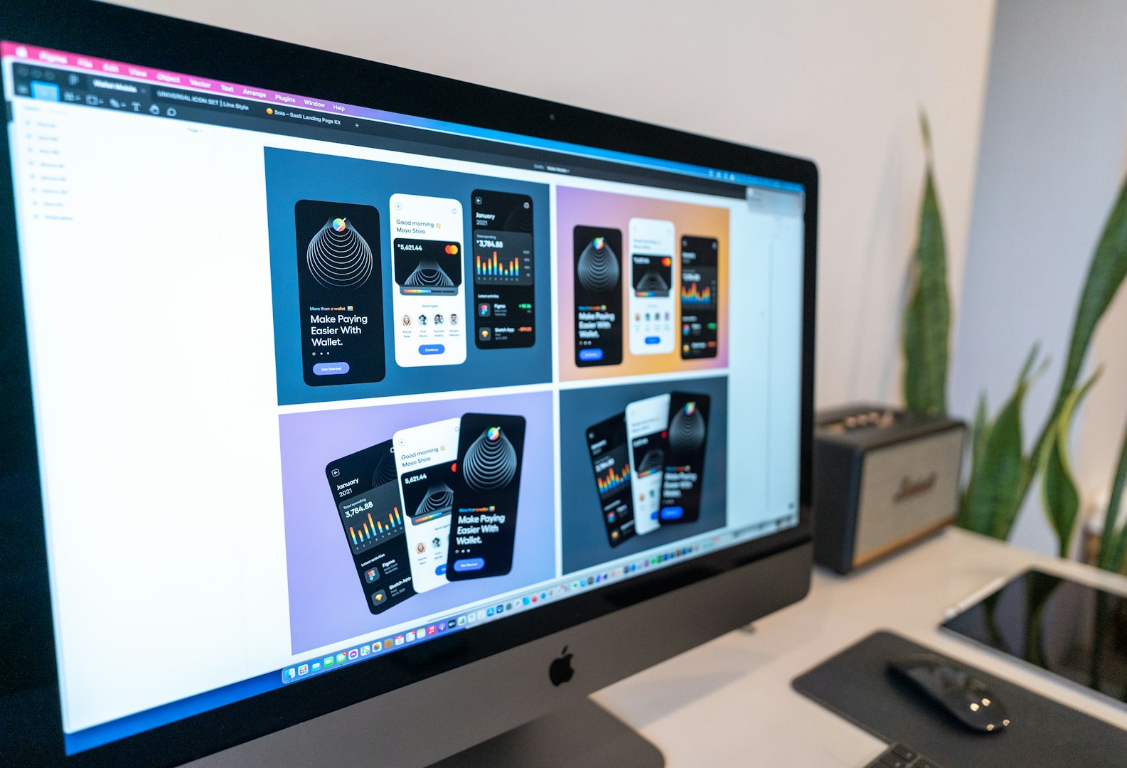 Silver iMac on white table representing professional web design studio