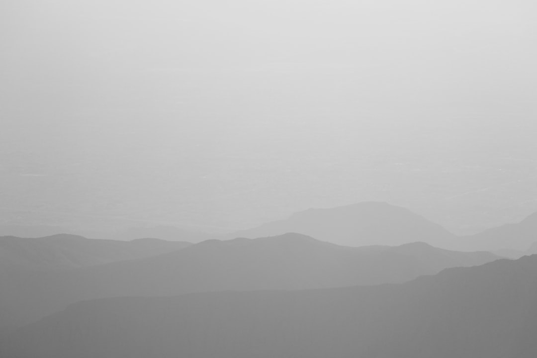 black mountains under white sky during daytime