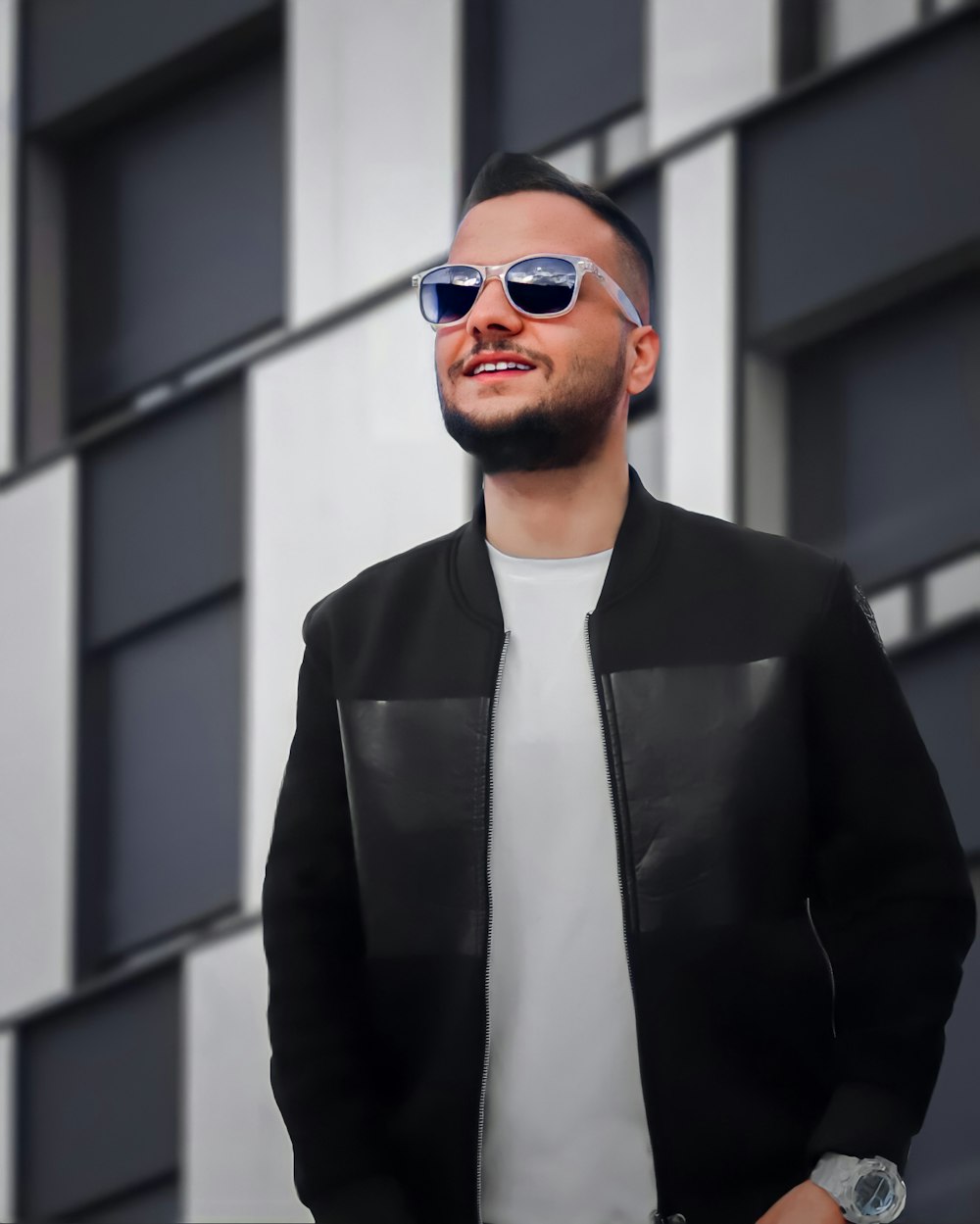 man in black suit wearing sunglasses