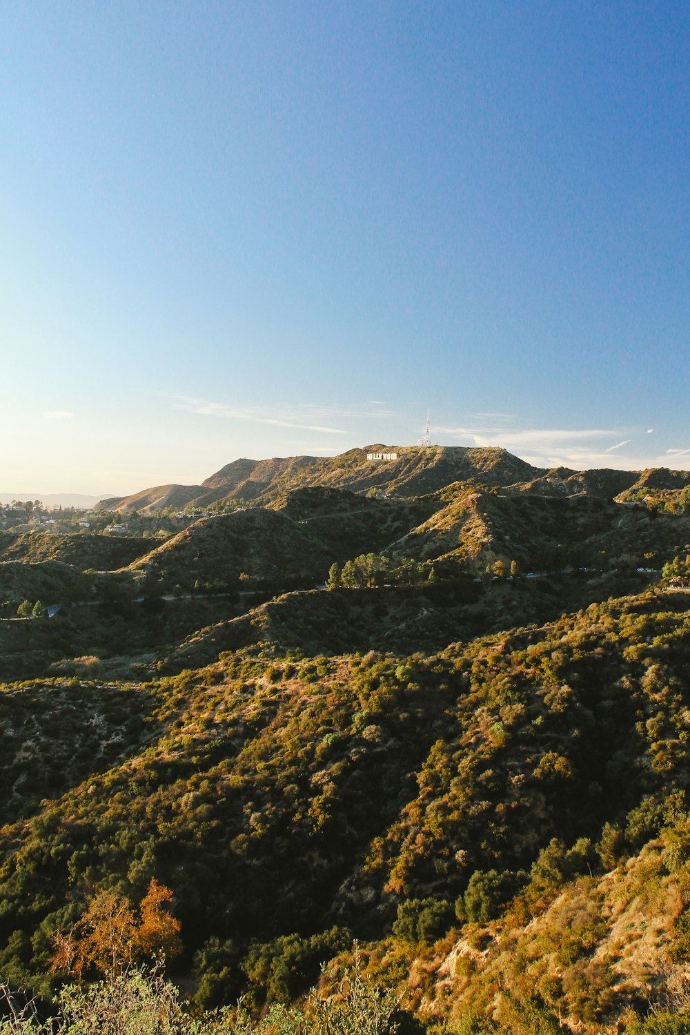 green and brown mountains under blue sky during daytime