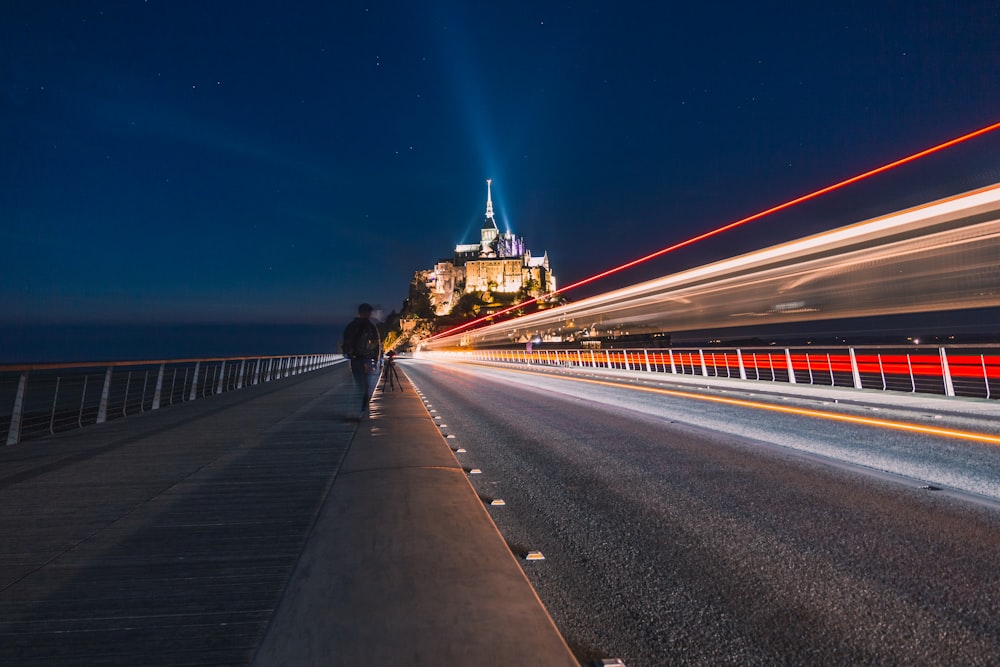 time lapse photography of cars on road during night time