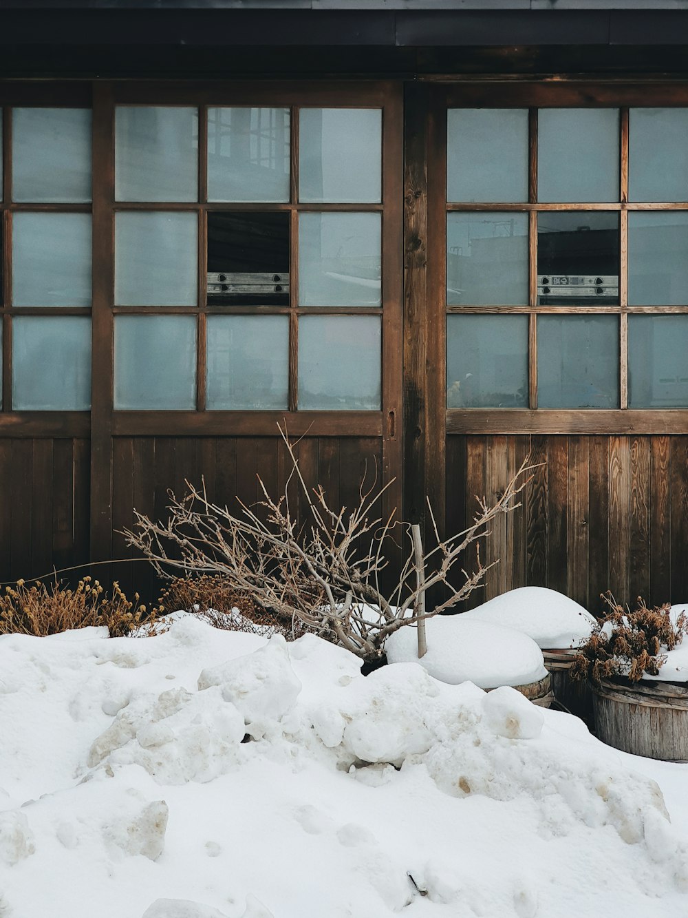 brown wooden framed glass window