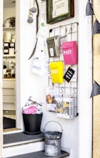 yellow plastic container on white wooden shelf