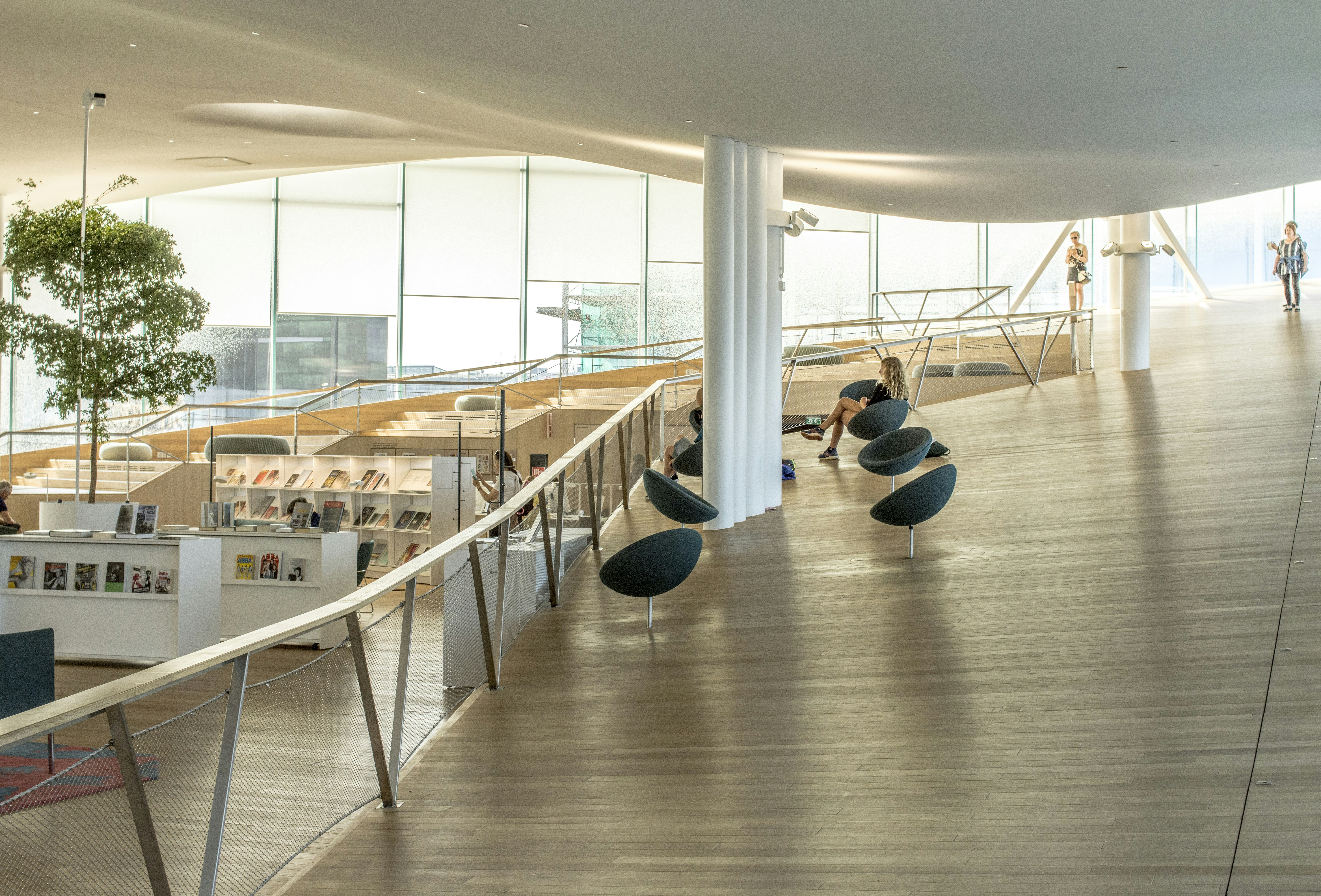 people sitting on chair inside building