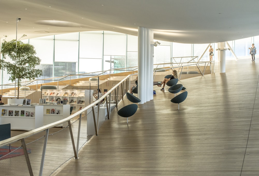 people sitting on chair inside building